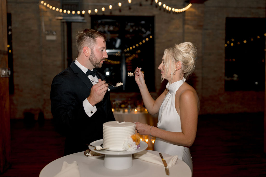 cake cutting bride and groom
