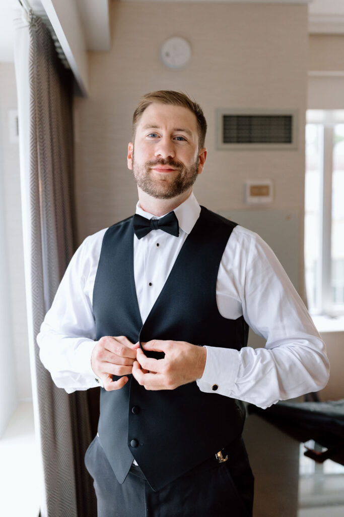 groom getting ready for wedding
