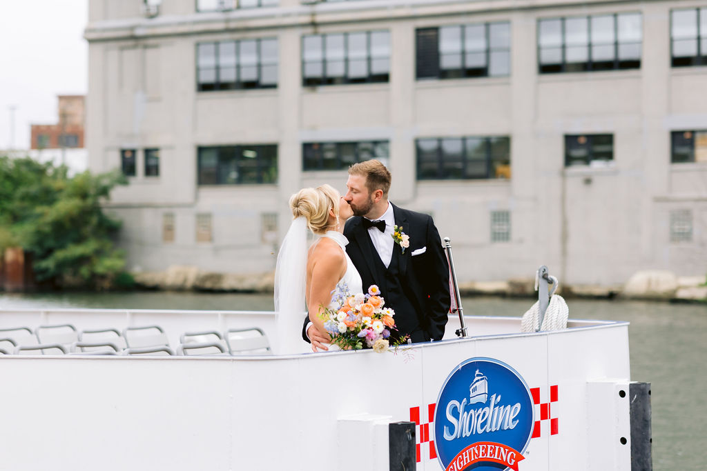 bride and groom on a boat
