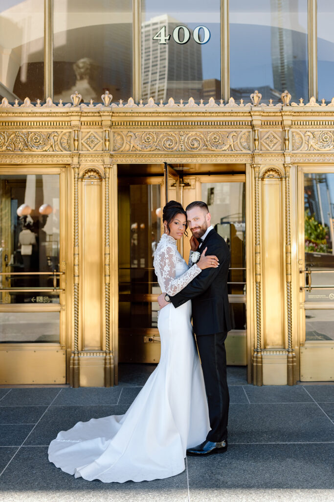 bride and groom portraits at Wrigley building